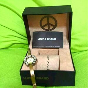 LUCKY BRAND Women's Gold Flower Horseshoe Shape Watch  With Book & Black Box